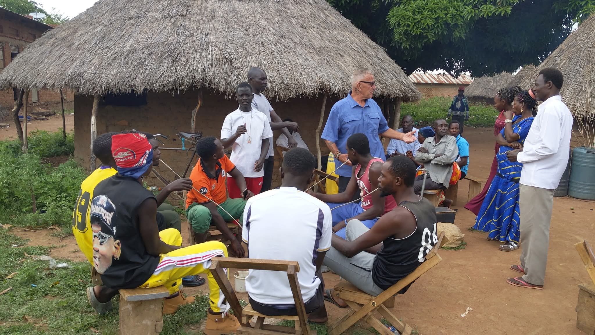 Mission team members sharing the Gospel inside a local bar during the 2025 Uganda mission, reaching people with the message of hope in Christ.