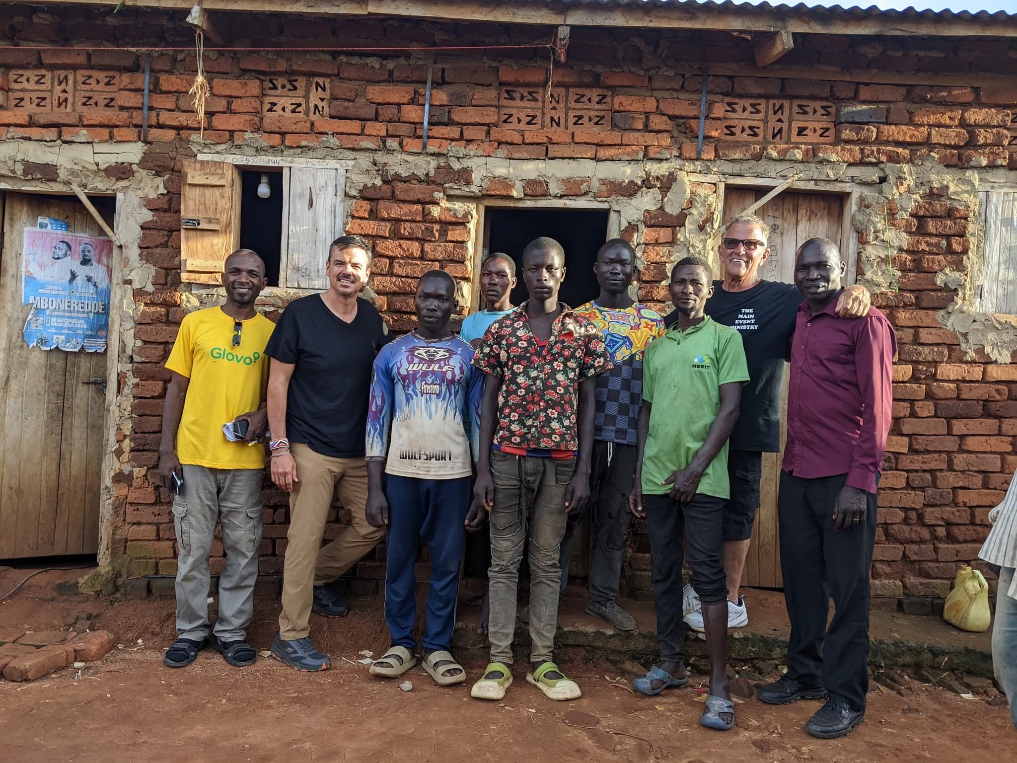 Young men in Uganda standing together after receiving Jesus during a door-to-door evangelism mission, we thank God for Pastor John Friedit and Pastor Lic Liven good from Florida in the USA.